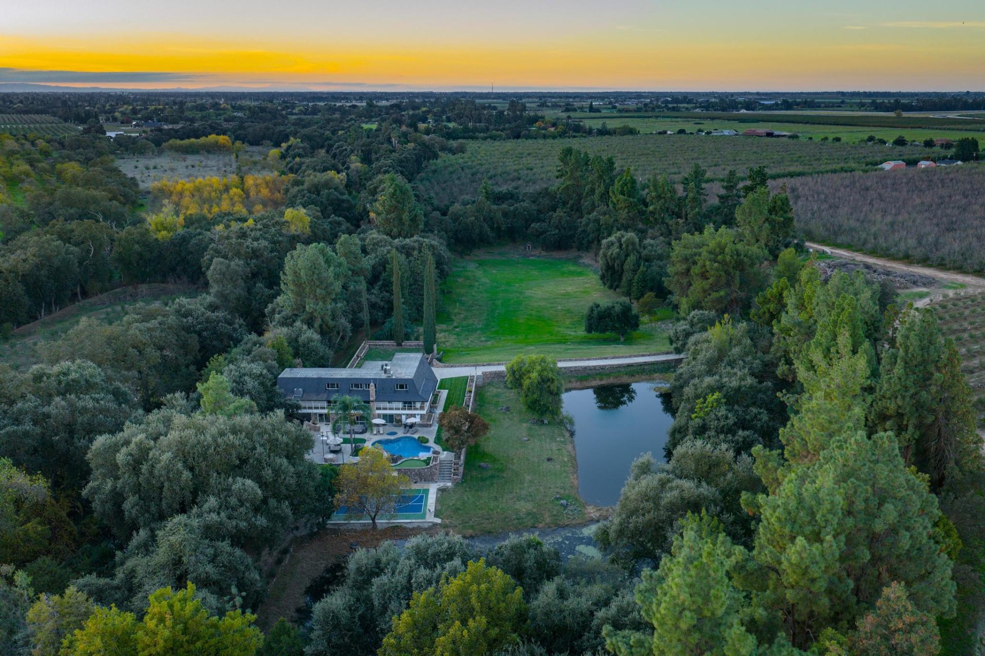 Aerial view of the entire estate at sunset