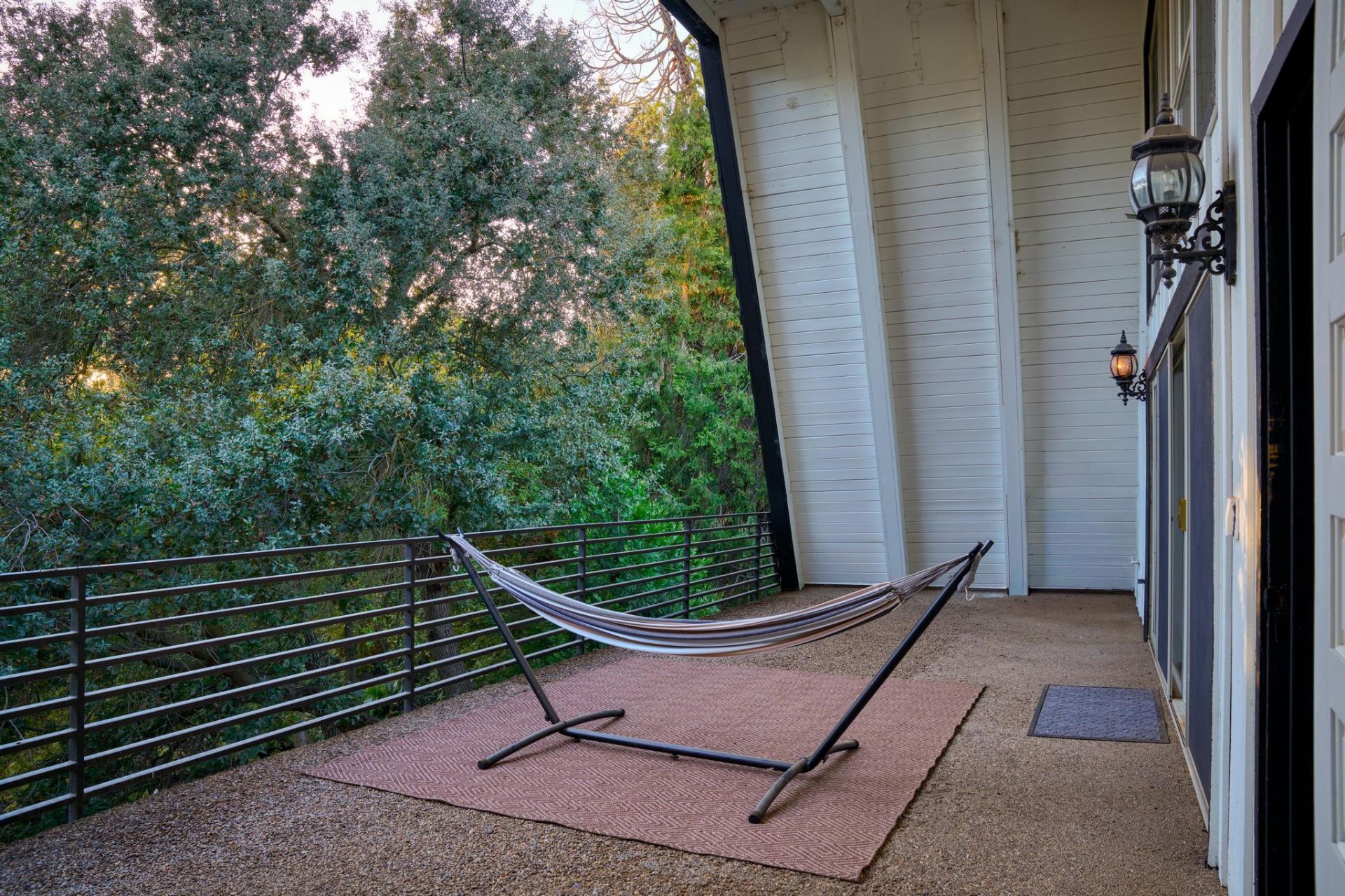 Private balcony with hammock overlooking the creek