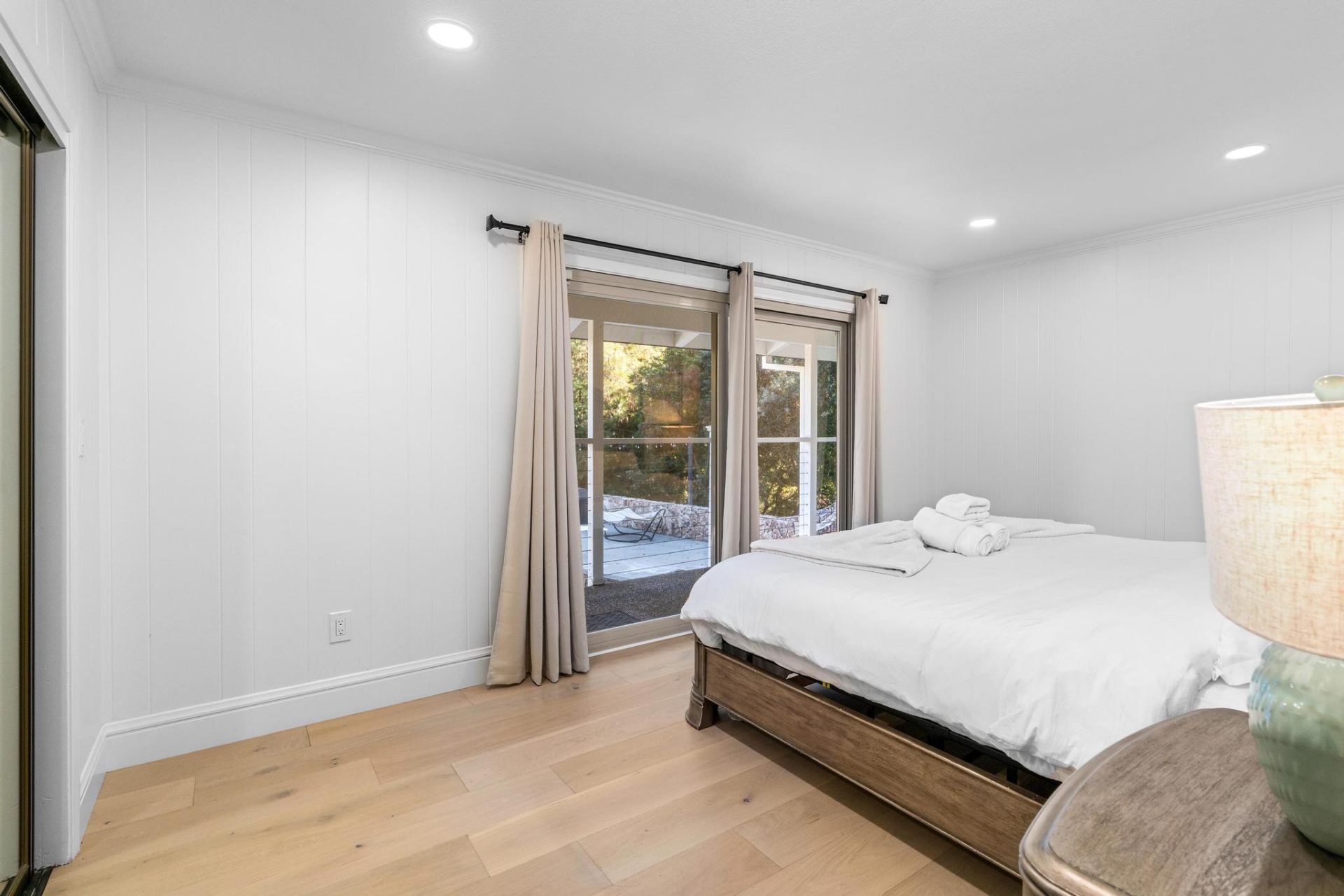 Guest bedroom opening to pool patio