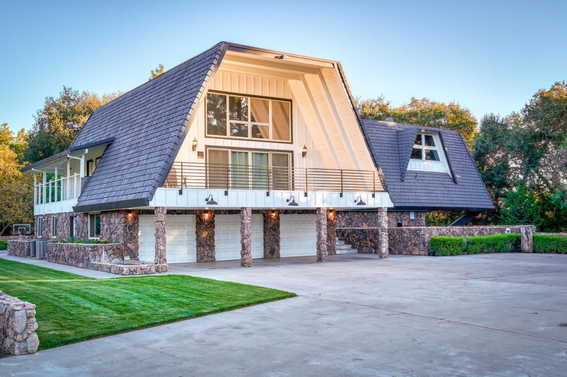 Estate front exterior with stone columns