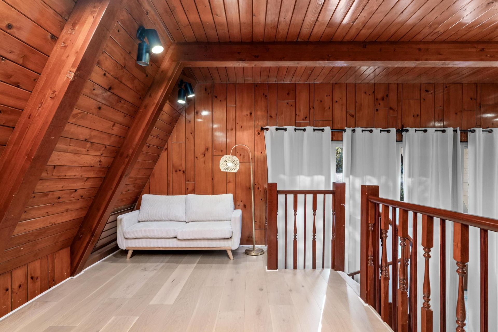 A-frame loft lounge with vaulted cedar ceilings